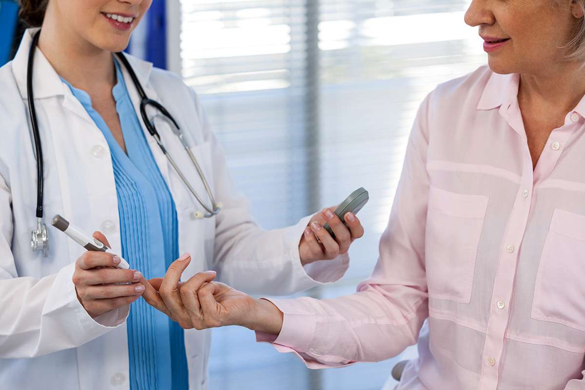 Photo of a medical practitioner monitoring their glucose for the Thyroid doctor of Tampa's blog