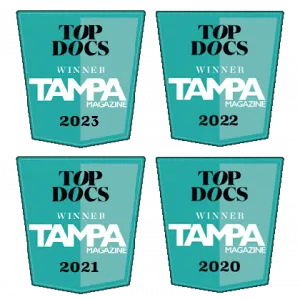 2021-2023 Top Docs awards in turquoise with ethe words Top Docs Winner Tampa Magazine text written on it
